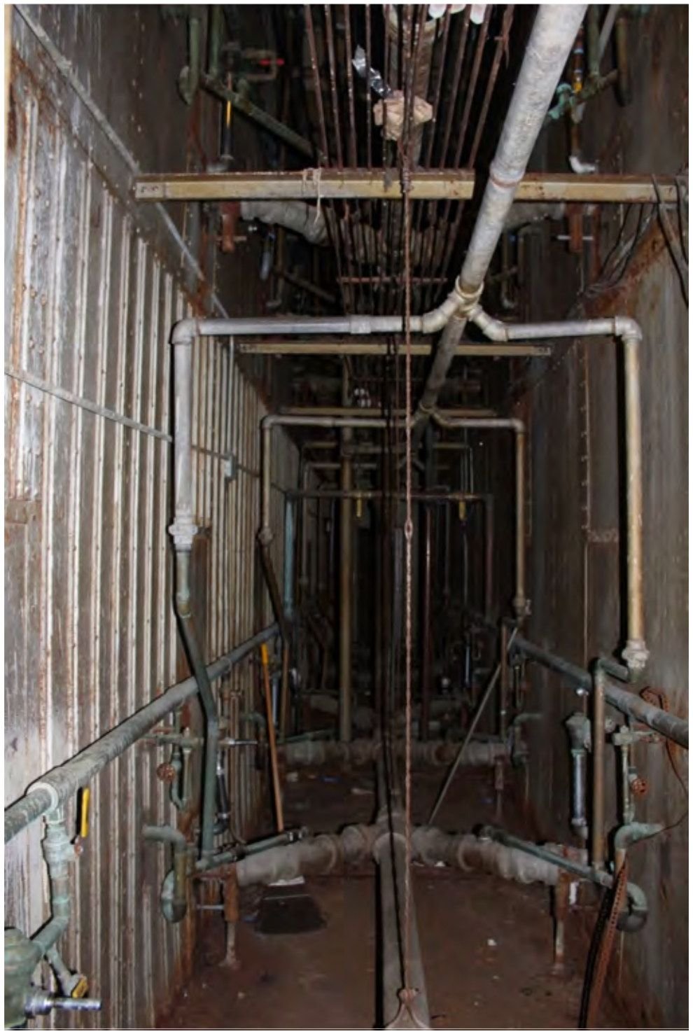 The “chase”, the plumbing and electrical shaft between the cell rows in A Block.