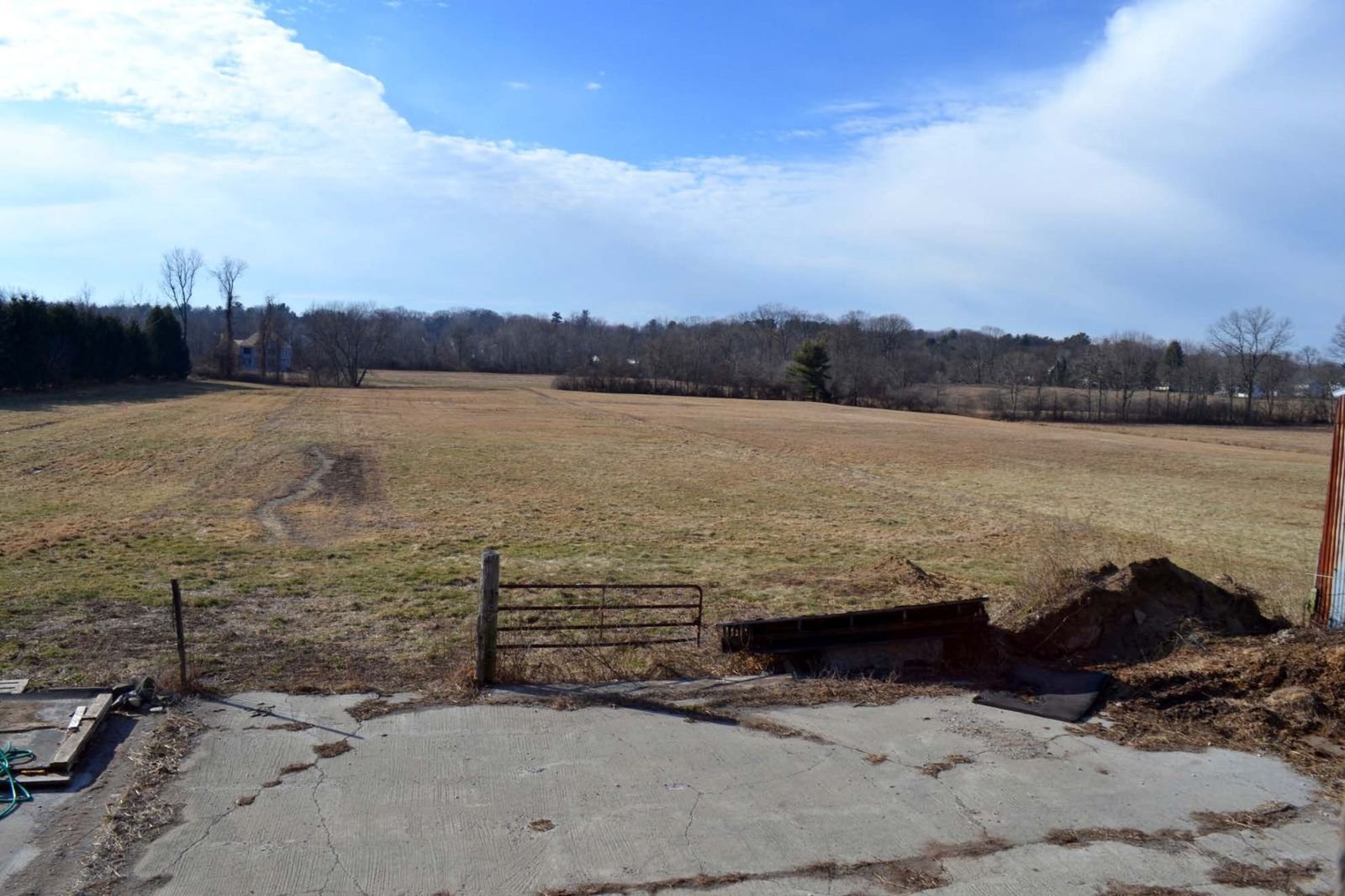 View west over the pasture from the hay loft door.